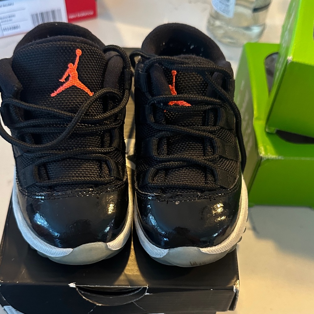 Jordan Kids Black and Orange Sneakers